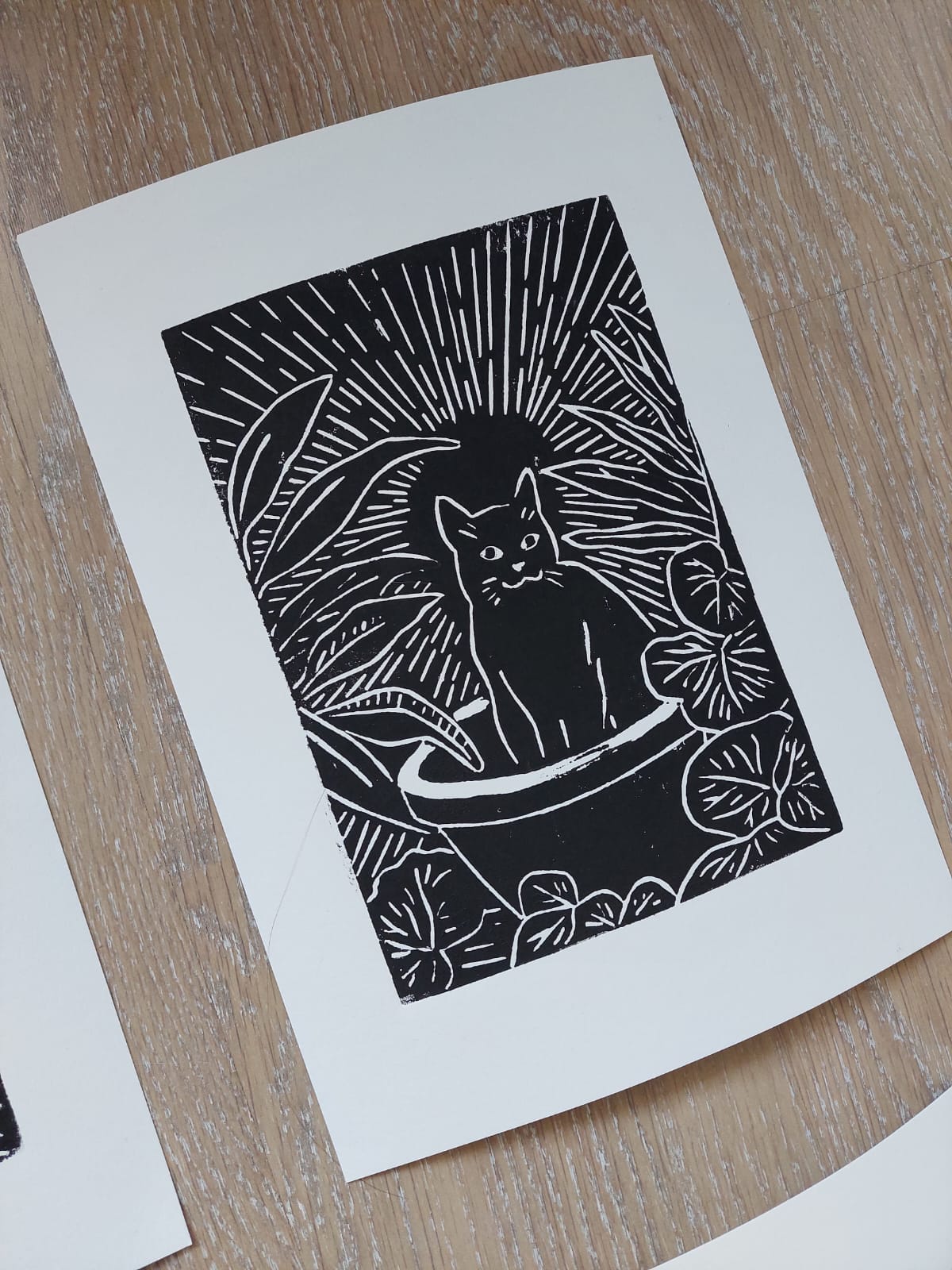 Gelimiteerde linoprint - kat met planten